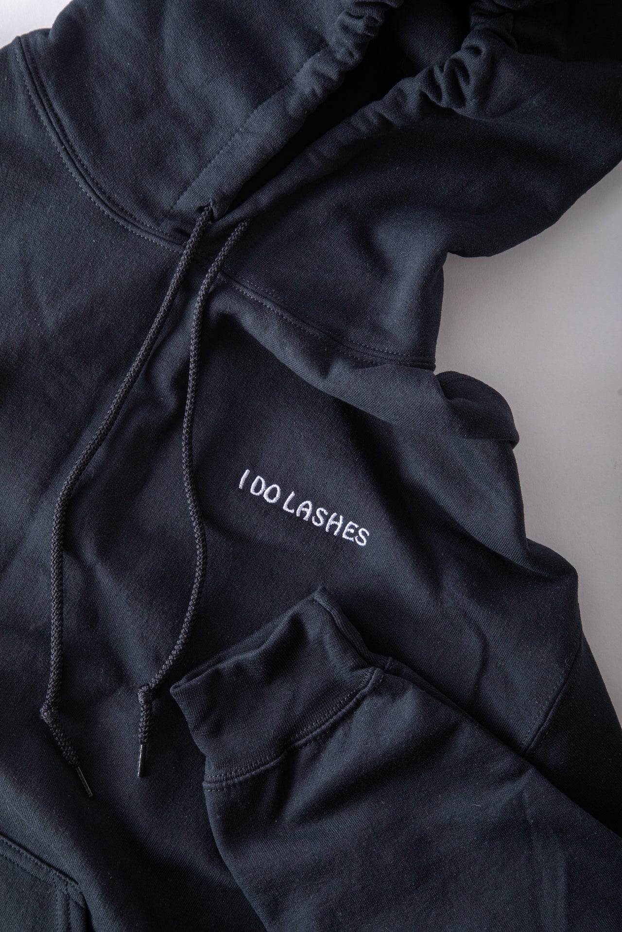"I DO LASHES" HOODED SWEATSHIRT